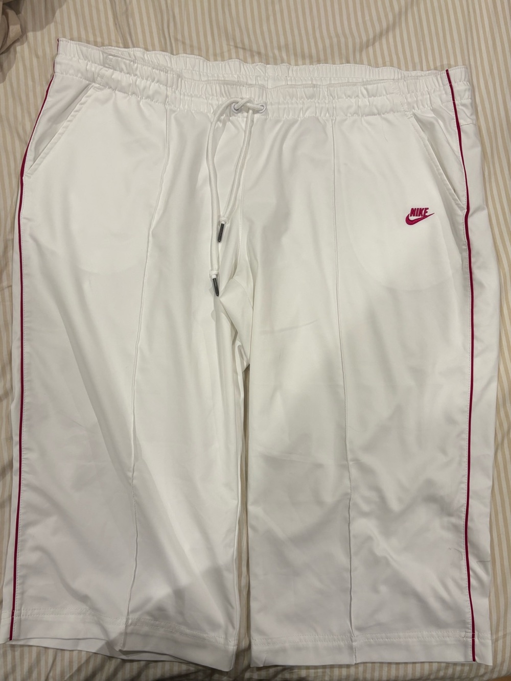 cropped white nike track pants